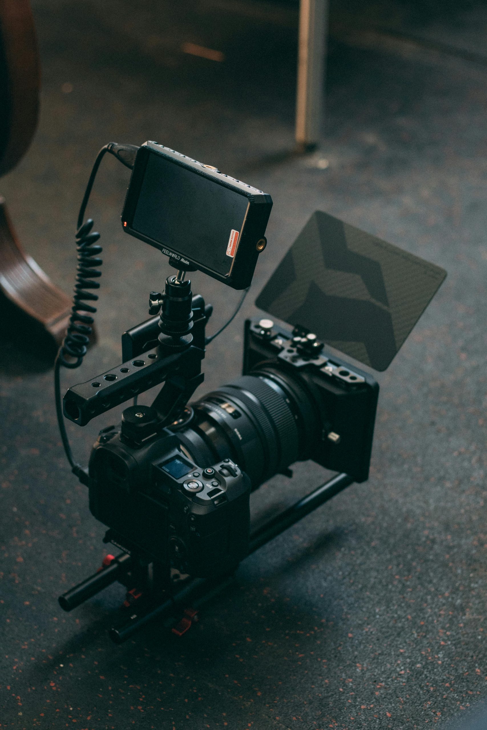 Close-up of a professional camera rig setup used for movie production, showcasing electronics and filming technology.